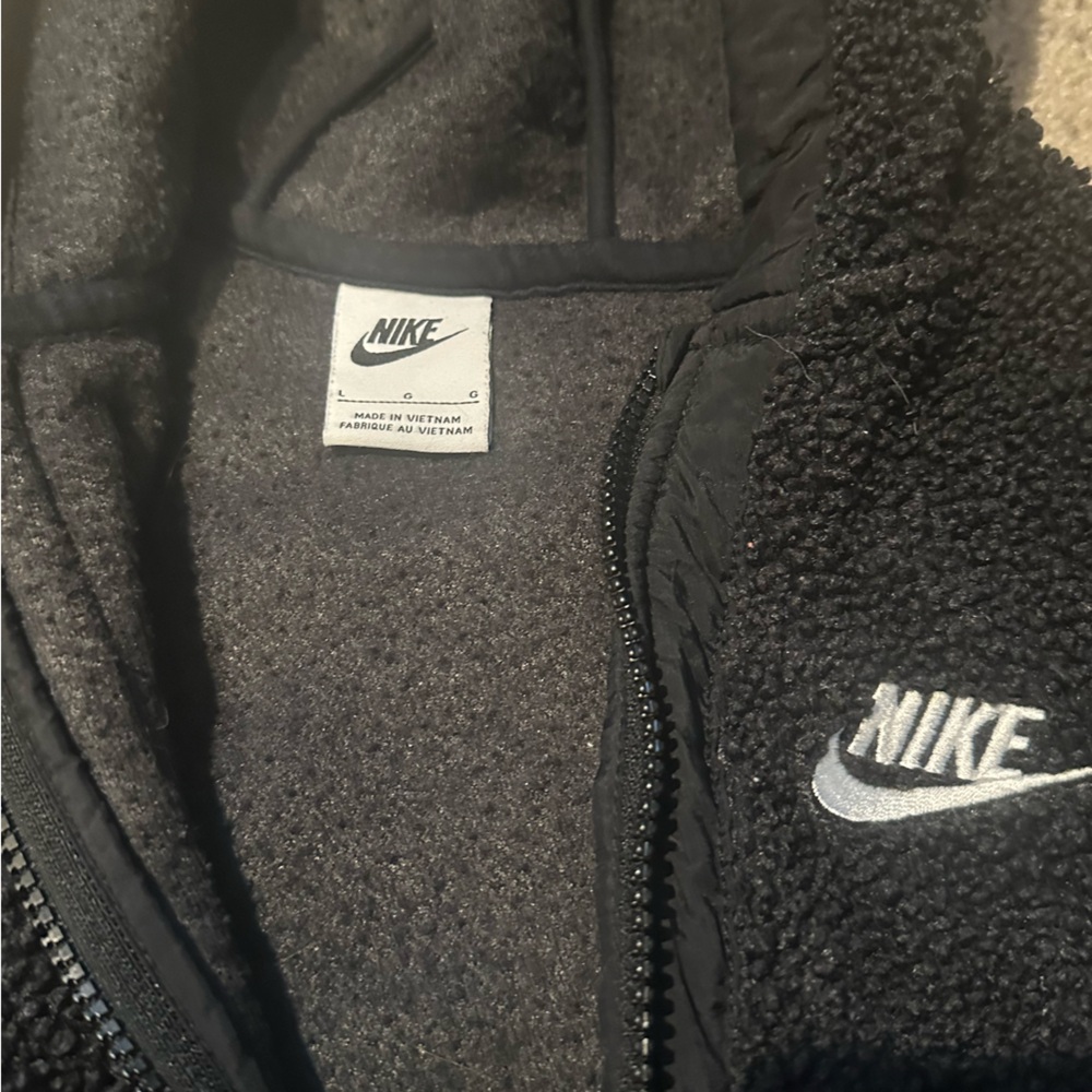 Used youth large 1 year old Nike Sherpa fleece jacket. Great condition